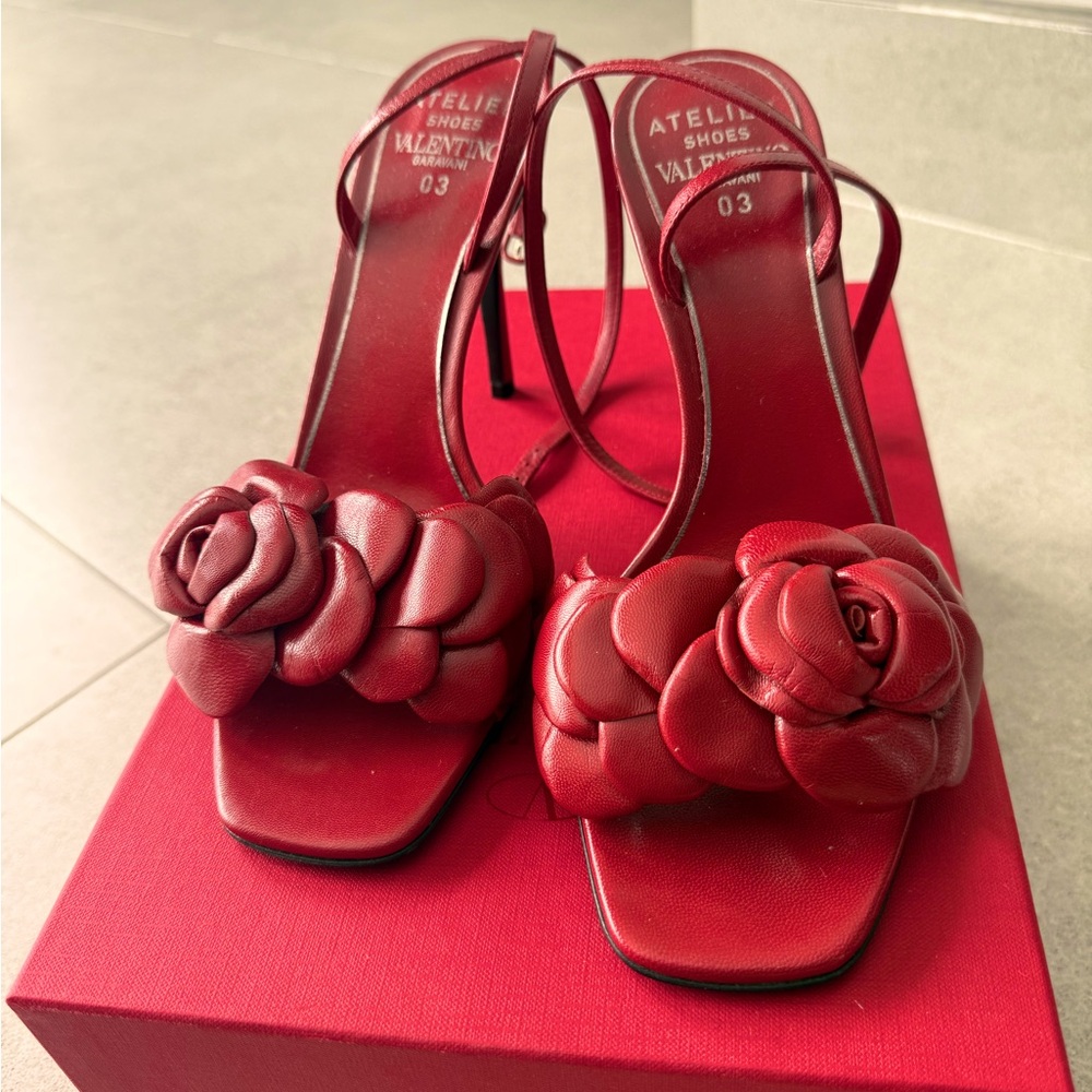 Valentino Garavani atelier red leather sandals.